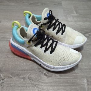 Nike Athletic Shoes in Cream, Blue, and Red